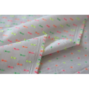 tissu en coton plumetis avec fluo vert, rose et jaune